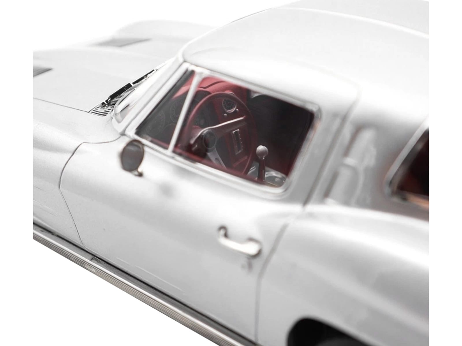 1963 Chevrolet Corvette Sting Ray Sebring Silver Metallic with Red Interior 1/18 Diecast Model Car by Norev - Image 2