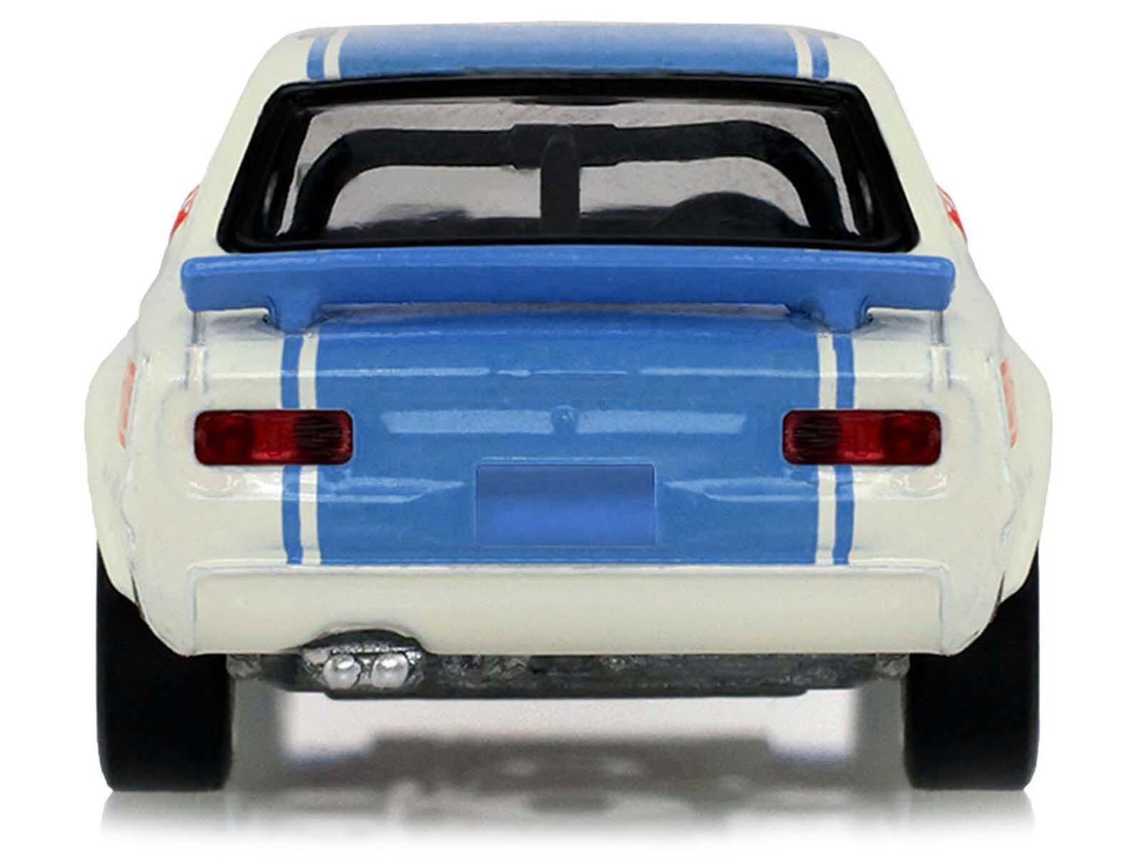 1972 Nissan Skyline 2000 GT-R (KPGC10) RHD (Right Hand Drive) #15 Kunimitsu Takahashi "50th Victory" White with Blue Stripe "Tokyo Torque" Series 10 1/64 Diecast Model Car by Greenlight - Image 5