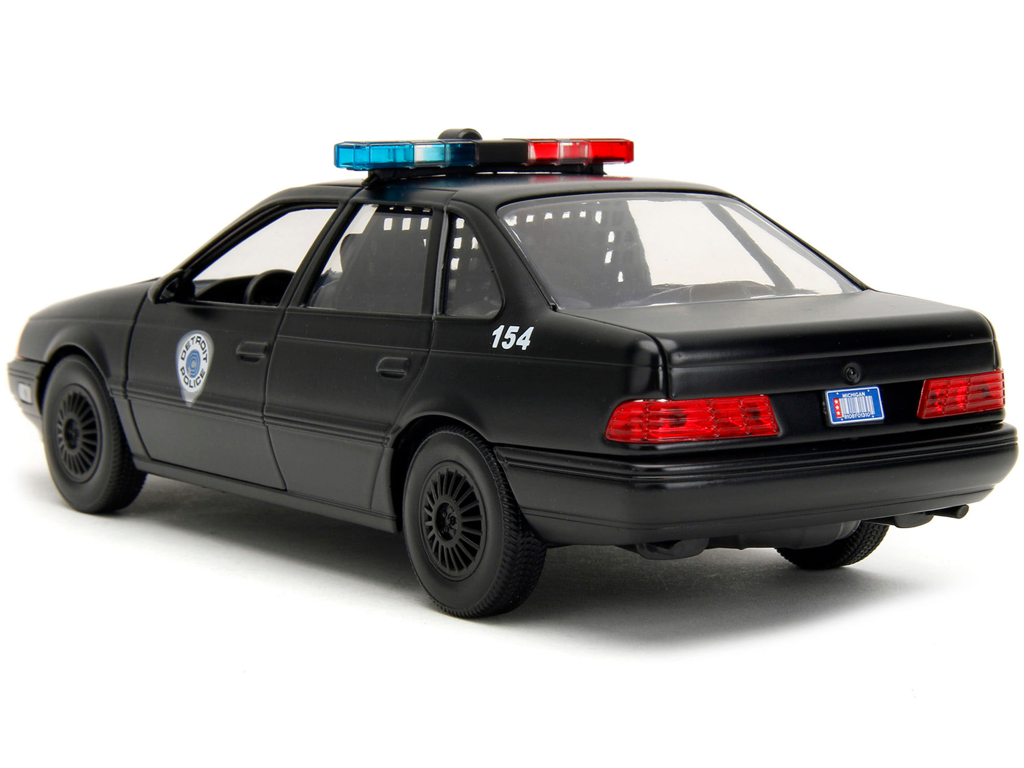 Ford Taurus OCP Matt Black "Detroit Police" and Robocop Diecast Figure 35th Anniversary "Robocop" (1987) Movie "Hollywood Rides" Series 1/24 Diecast Model Car by Jada - Image 2