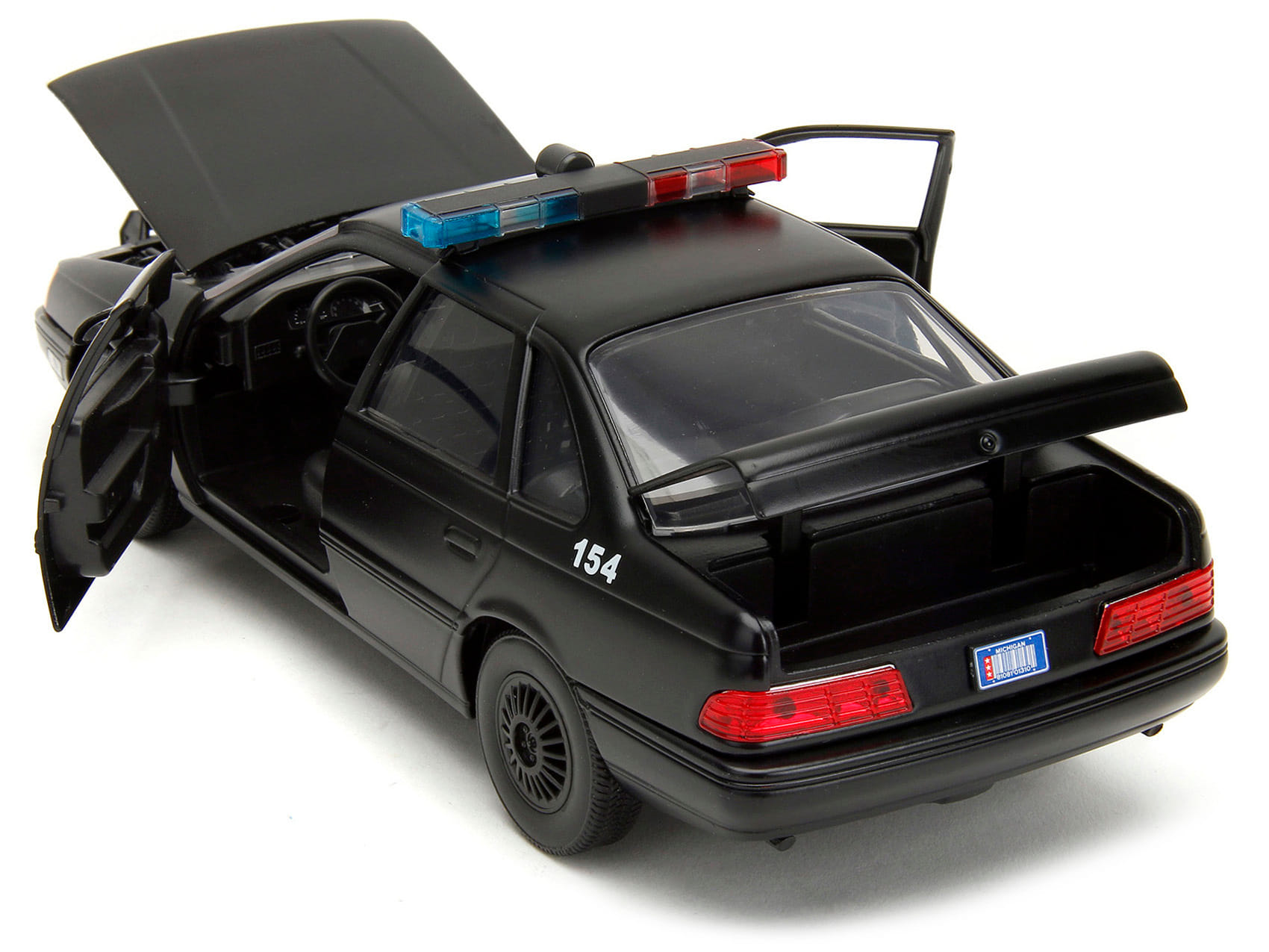 Ford Taurus OCP Matt Black "Detroit Police" and Robocop Diecast Figure 35th Anniversary "Robocop" (1987) Movie "Hollywood Rides" Series 1/24 Diecast Model Car by Jada - Image 4