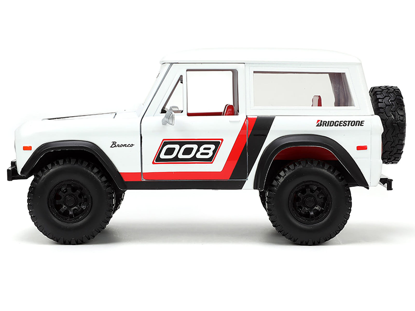 1973 Ford Bronco #008 White with Red and Black Stripes and Red Interior with Extra Wheels "Just Trucks" Series 1/24 Diecast Model Car by Jada - Image 2