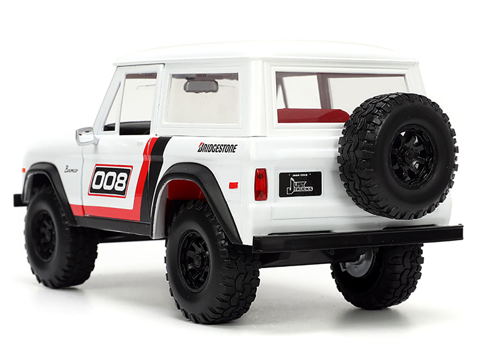 1973 Ford Bronco #008 White with Red and Black Stripes and Red Interior with Extra Wheels "Just Trucks" Series 1/24 Diecast Model Car by Jada - Image 3