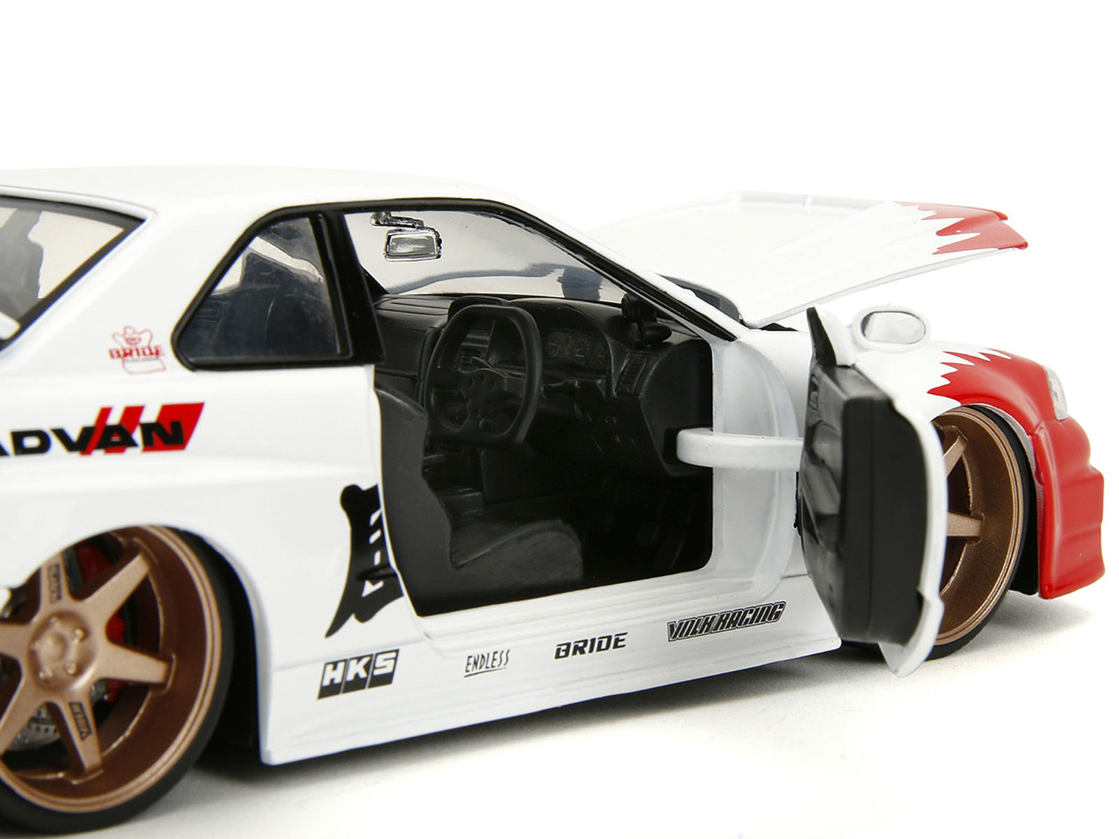 2002 Nissan Skyline GT-R (R34) RHD (Right Hand Drive) White with Red Graphics and Ryu Diecast Figure "Street Fighter" Video Game "Anime Hollywood Rides" Series 1/24 Diecast Model Car by Jada