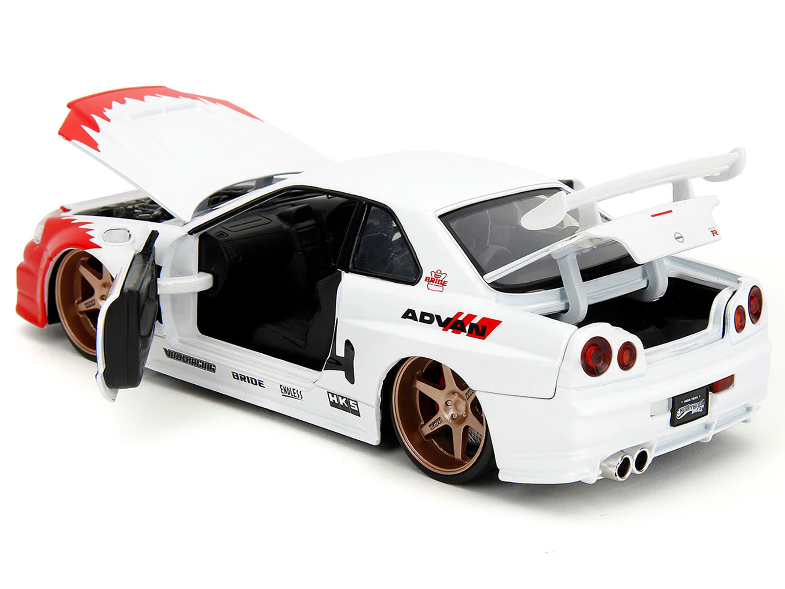 2002 Nissan Skyline GT-R (R34) RHD (Right Hand Drive) White with Red Graphics and Ryu Diecast Figure "Street Fighter" Video Game "Anime Hollywood Rides" Series 1/24 Diecast Model Car by Jada - Image 3