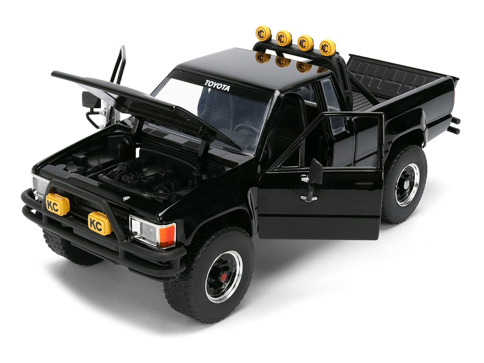 1985 Toyota SR5 Pickup Truck Black with Marty's Skateboard "Back to the Future" (1985) Movie "Hollywood Rides" Series 1/24 Diecast Model Car by Jada - Image 2