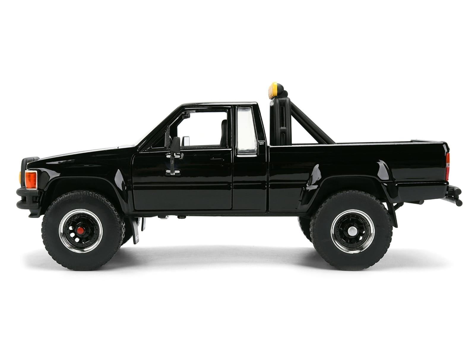 1985 Toyota SR5 Pickup Truck Black with Marty's Skateboard "Back to the Future" (1985) Movie "Hollywood Rides" Series 1/24 Diecast Model Car by Jada - Image 3
