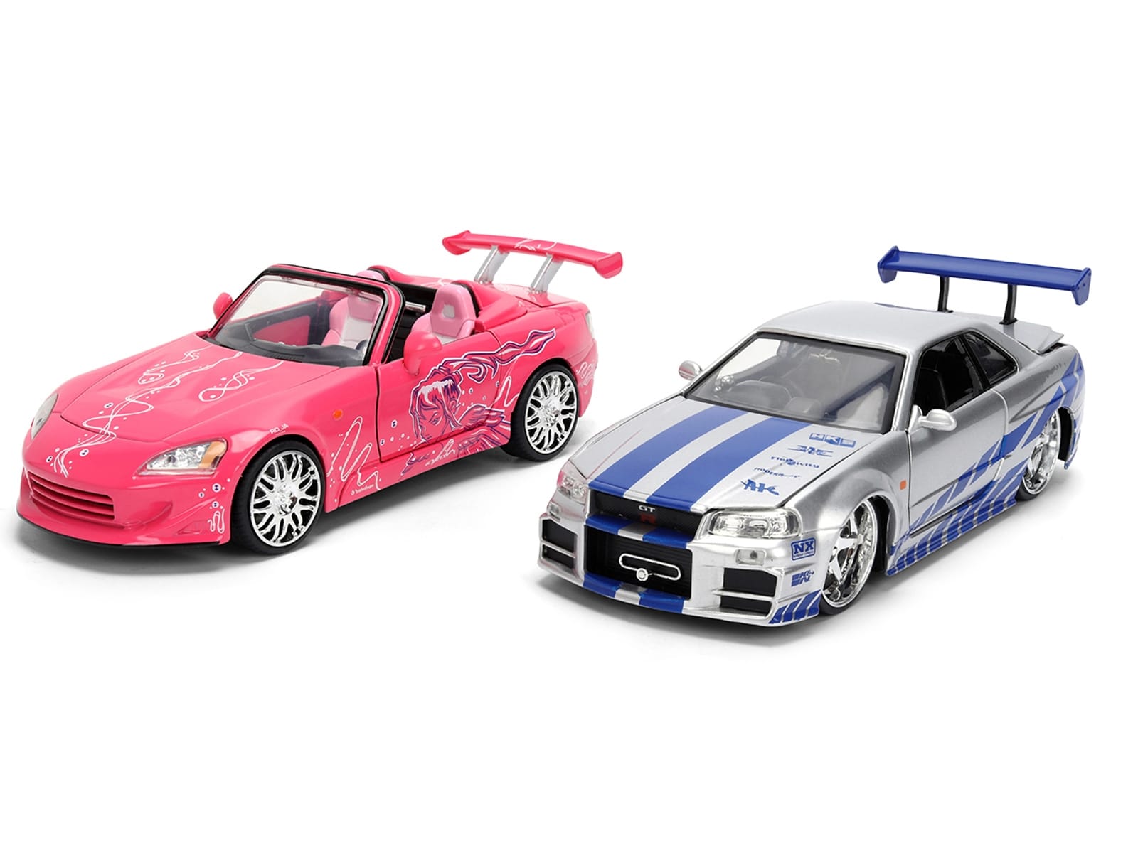 Brian's Nissan Skyline GT-R (R34) Silver Metallic with Blue Stripes and Suki's Honda S2000 Pink with Graphics Set of 2 Cars "Fast & Furious 25th Anniversary" "Fast & Furious" Series 1/24 Diecast Model Cars by Jada - Image 2