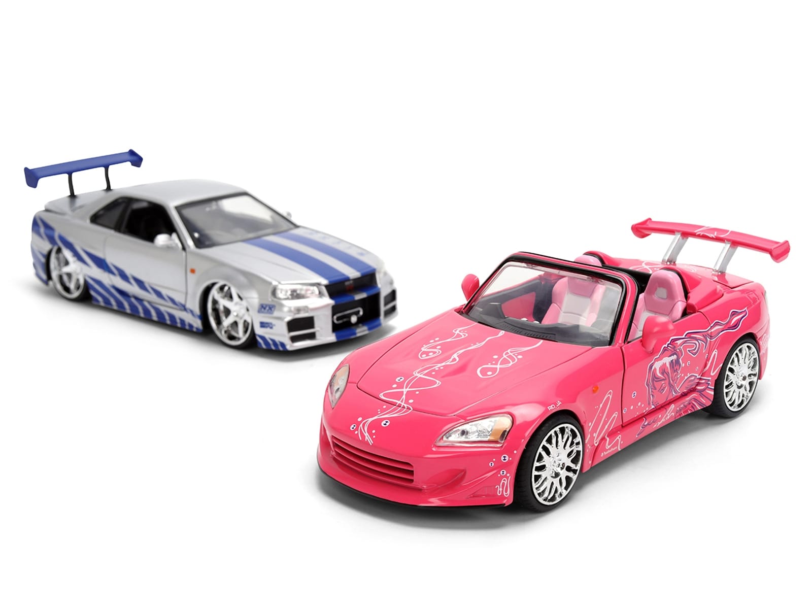 Brian's Nissan Skyline GT-R (R34) Silver Metallic with Blue Stripes and Suki's Honda S2000 Pink with Graphics Set of 2 Cars "Fast & Furious 25th Anniversary" "Fast & Furious" Series 1/24 Diecast Model Cars by Jada - Image 3