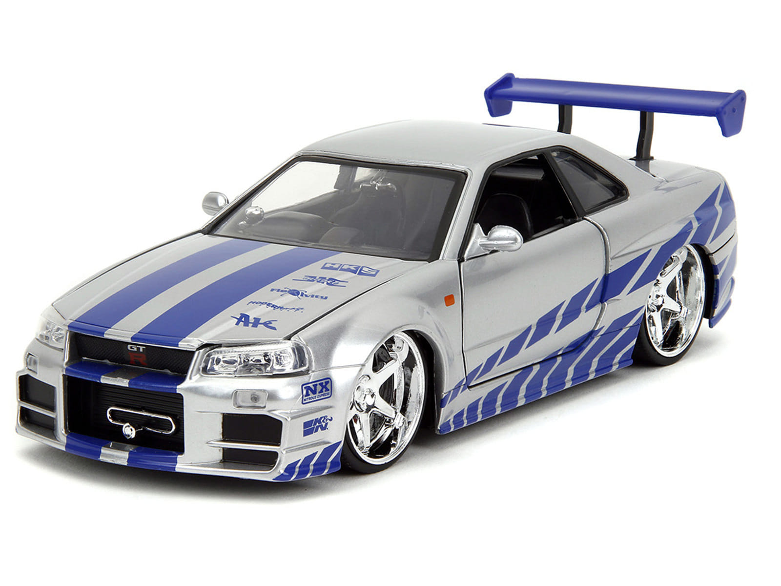 Brian's Nissan Skyline GT-R (R34) Silver Metallic with Blue Stripes and Suki's Honda S2000 Pink with Graphics Set of 2 Cars "Fast & Furious 25th Anniversary" "Fast & Furious" Series 1/24 Diecast Model Cars by Jada - Image 4