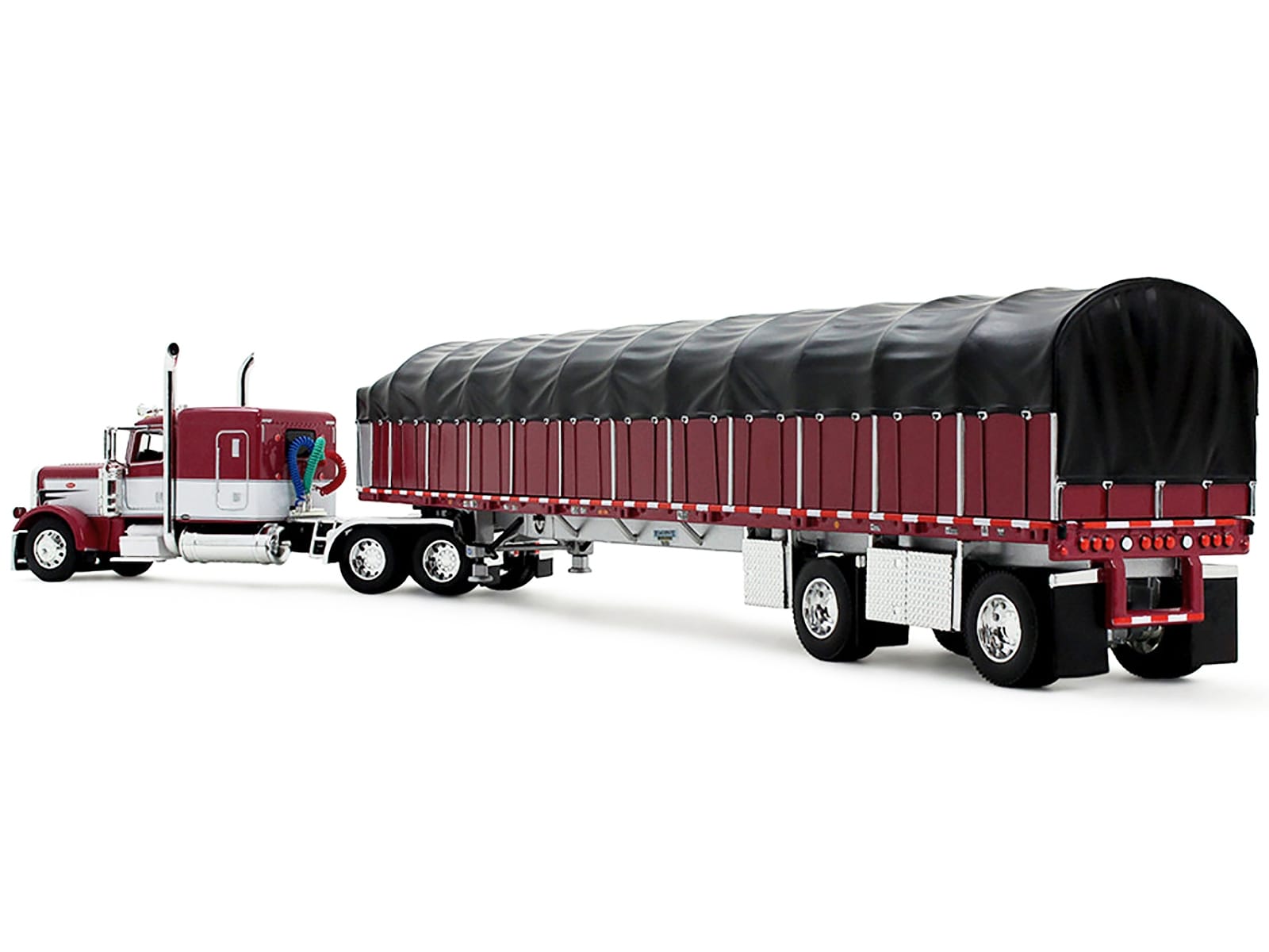 Peterbilt 389 with 63" Flat Top Sleeper and 53' Wilson Roadbrute Flatbed Trailer with Covered Wagon Maroon with White Stripes 1/64 Diecast Model by DCP/First Gear - Image 3