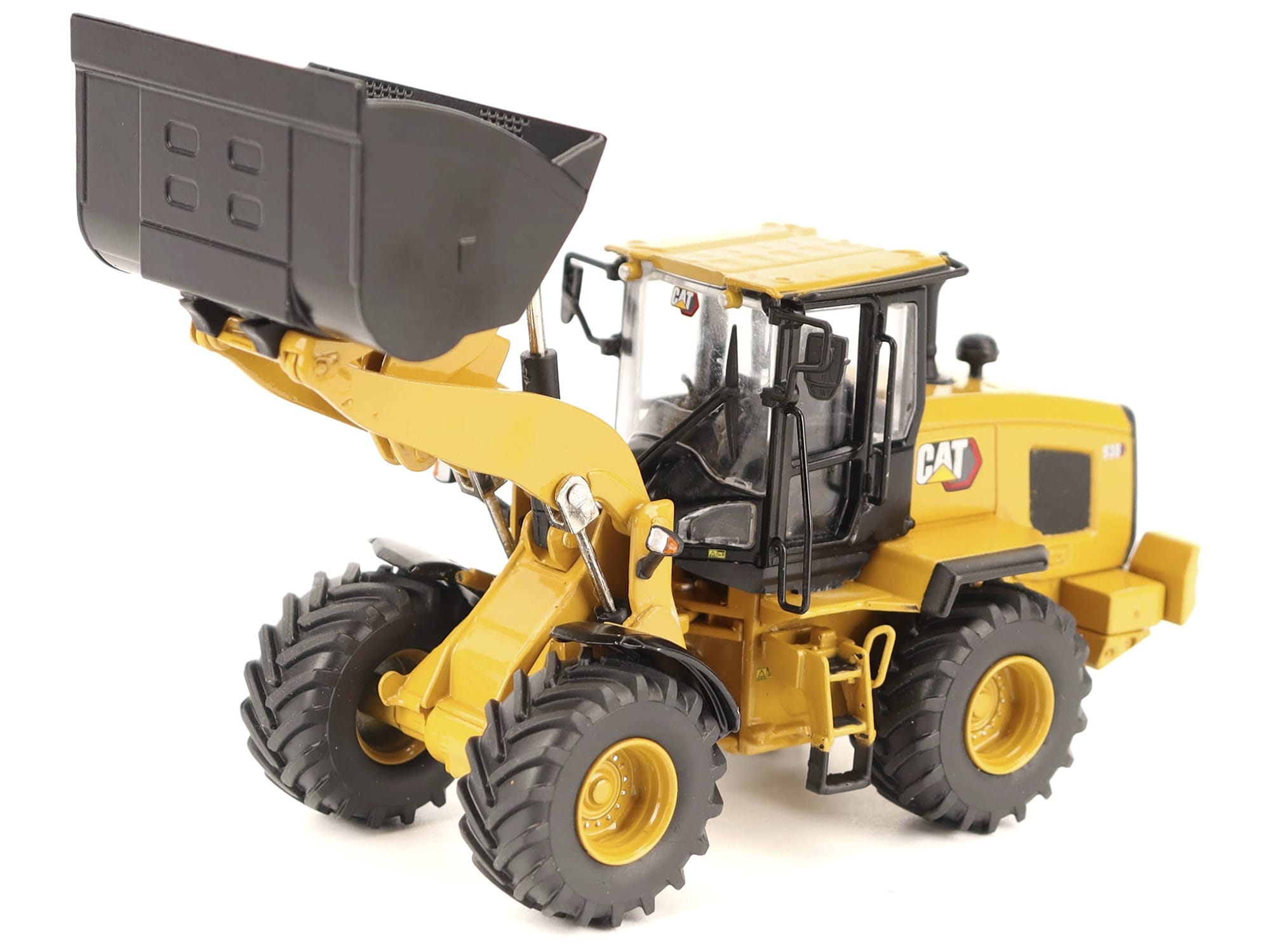CAT Caterpillar 938 Wheel Loader with Operator Yellow "High Line" Series 1/50 Diecast Model by Diecast Masters - Image 2