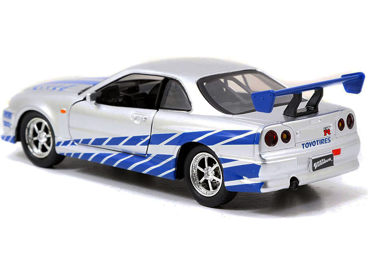 Brian's Nissan Skyline GT-R (R34) RHD (Right Hand Drive) Silver Metallic with Blue Stripes "2 Fast 2 Furious" (2003) Movie "Fast & Furious 25th Anniversary" Series 1/32 Diecast Car Model by Jada - Image 3