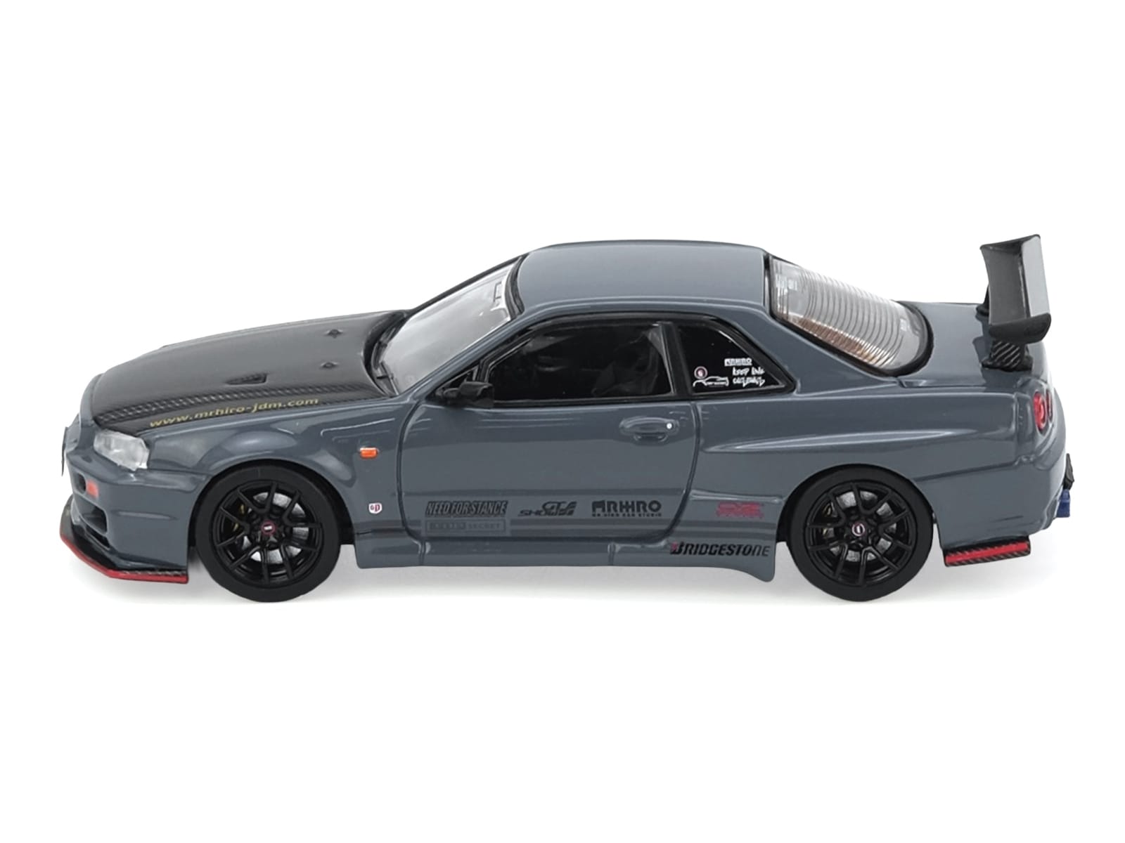Nissan Skyline GT-R (R34) "Top Secret" RHD (Right Hand Drive) Stealth Gray with Carbon Hood "GTSHOW 2025 Event Edition" 1/64 Diecast Model Car by Inno Models - Image 2