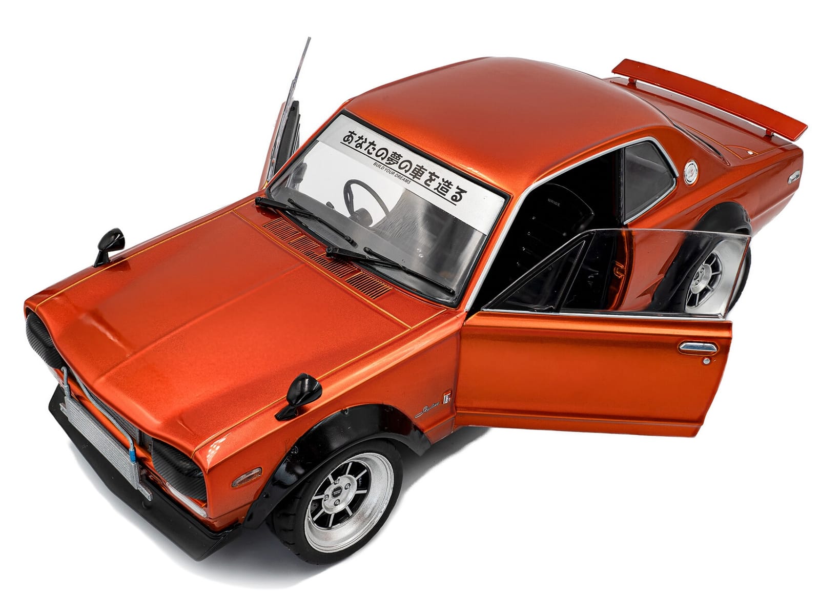 1970 Nissan Skyline (C10) Hakosuka RHD (Right Hand Drive) Orange Metallic 1/18 Diecast Model Car by Solido - Image 2